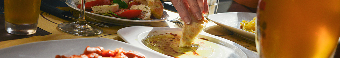Eating Greek Mediterranean Salad at Planet Gyros restaurant in Helena, MT.